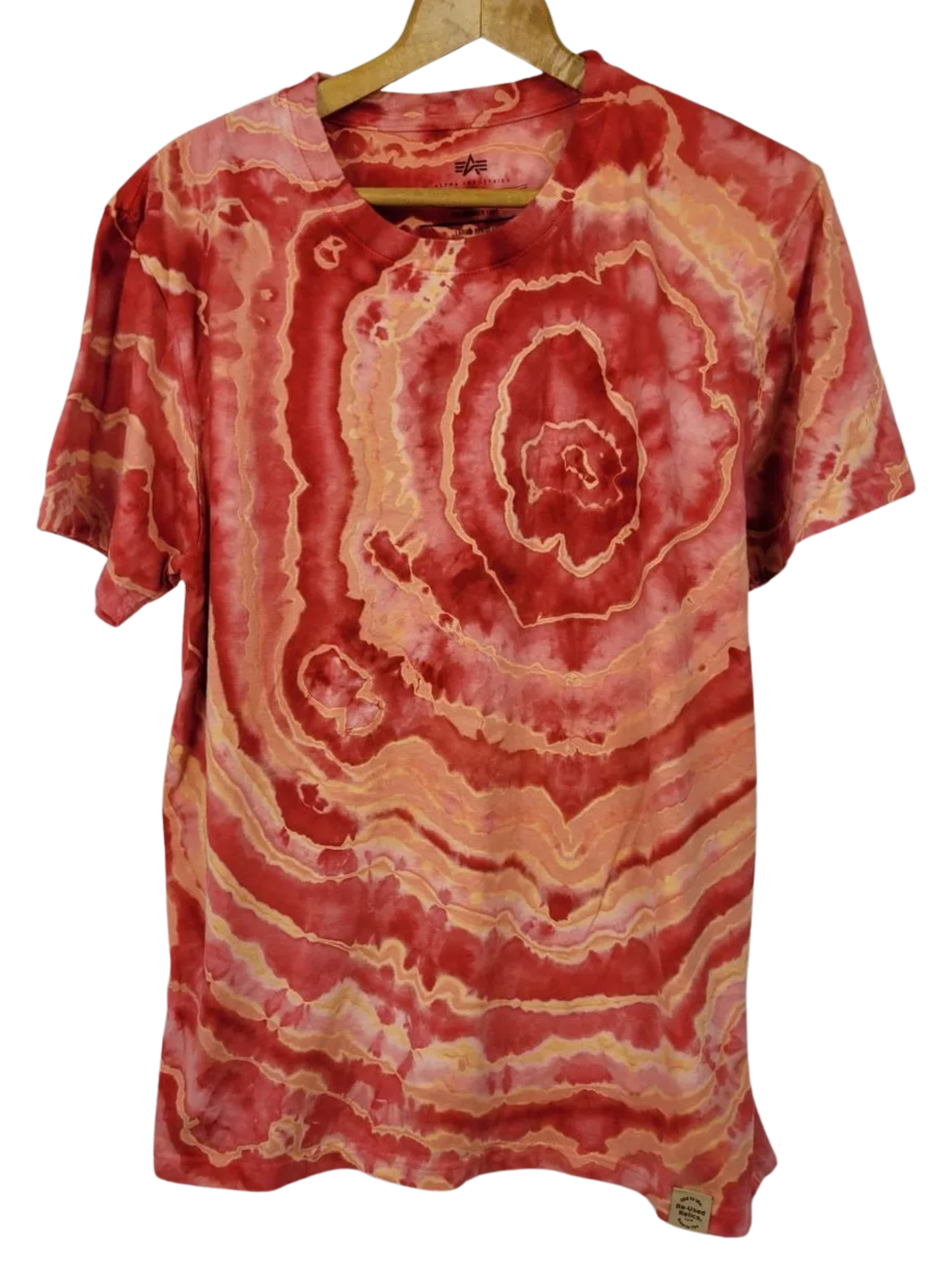 Red and orange tie-dye t-shirt on a hanger against a white background