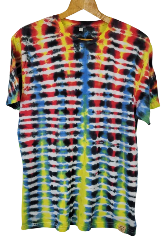 Multicolored tie-dye t-shirt on a hanger against a white background