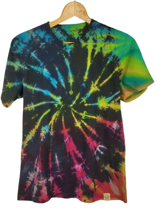 Tie-dye t-shirt with multicolor spiral pattern on a hanger