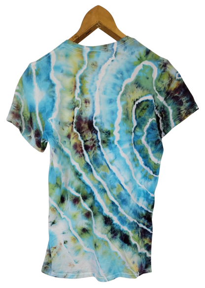 Colorful tie-dye t-shirt on a wooden hanger against a white background