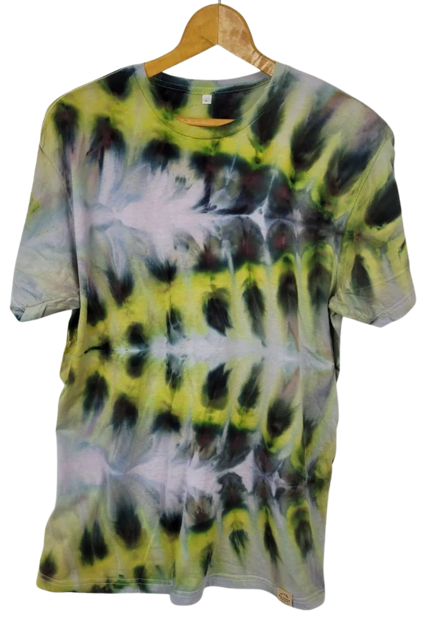 Tie-dye t-shirt on a wooden hanger with a white background
