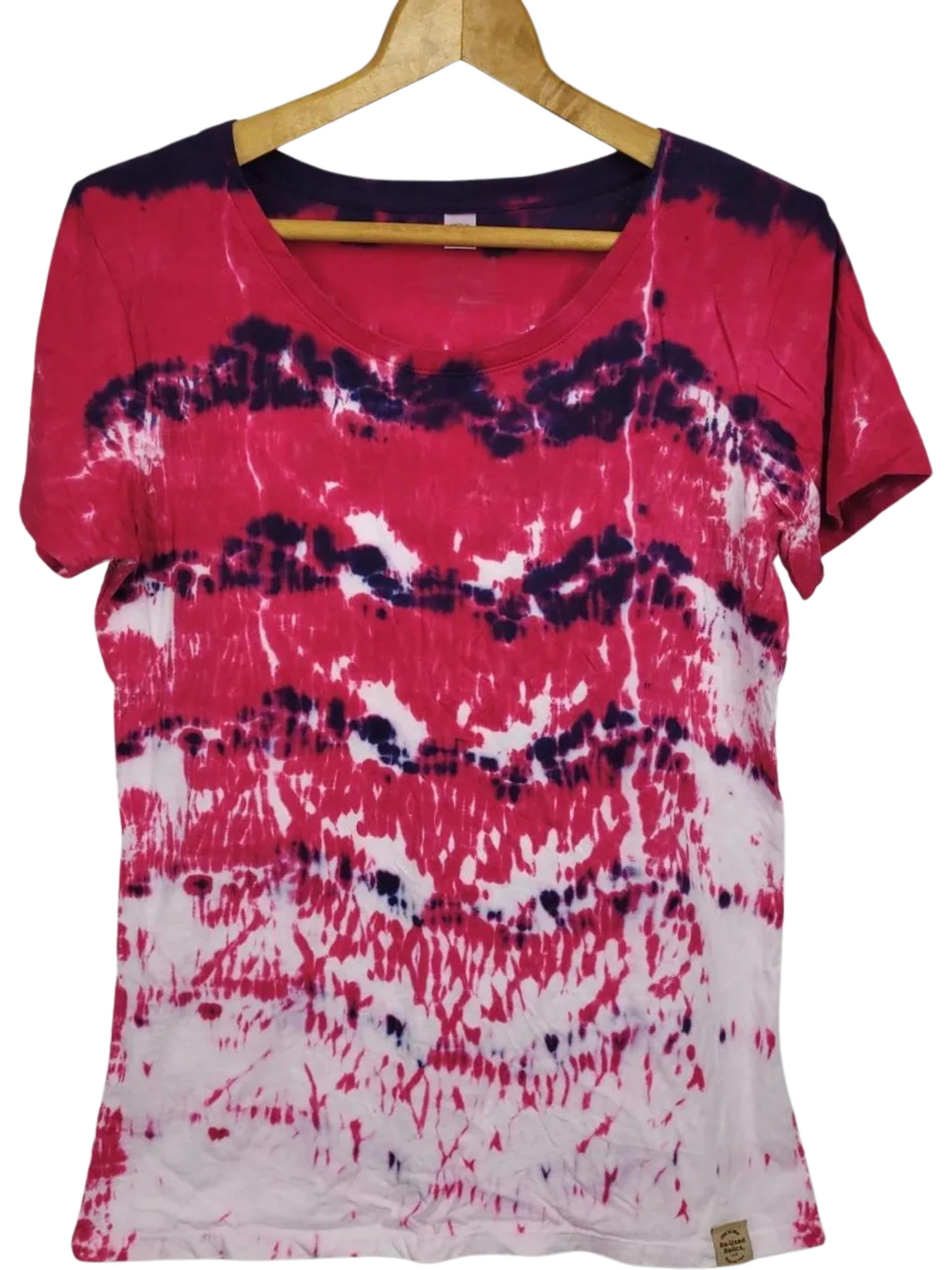 Tie-dye shirt with pink, purple, and white pattern on a hanger