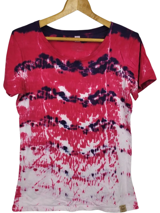 Tie-dye shirt with pink, purple, and white pattern on a hanger