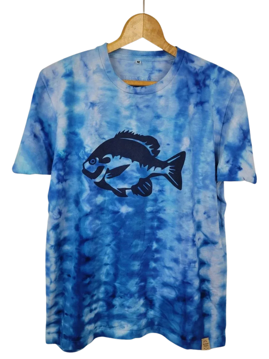 Blue tie-dye t-shirt with a fish graphic on a hanger