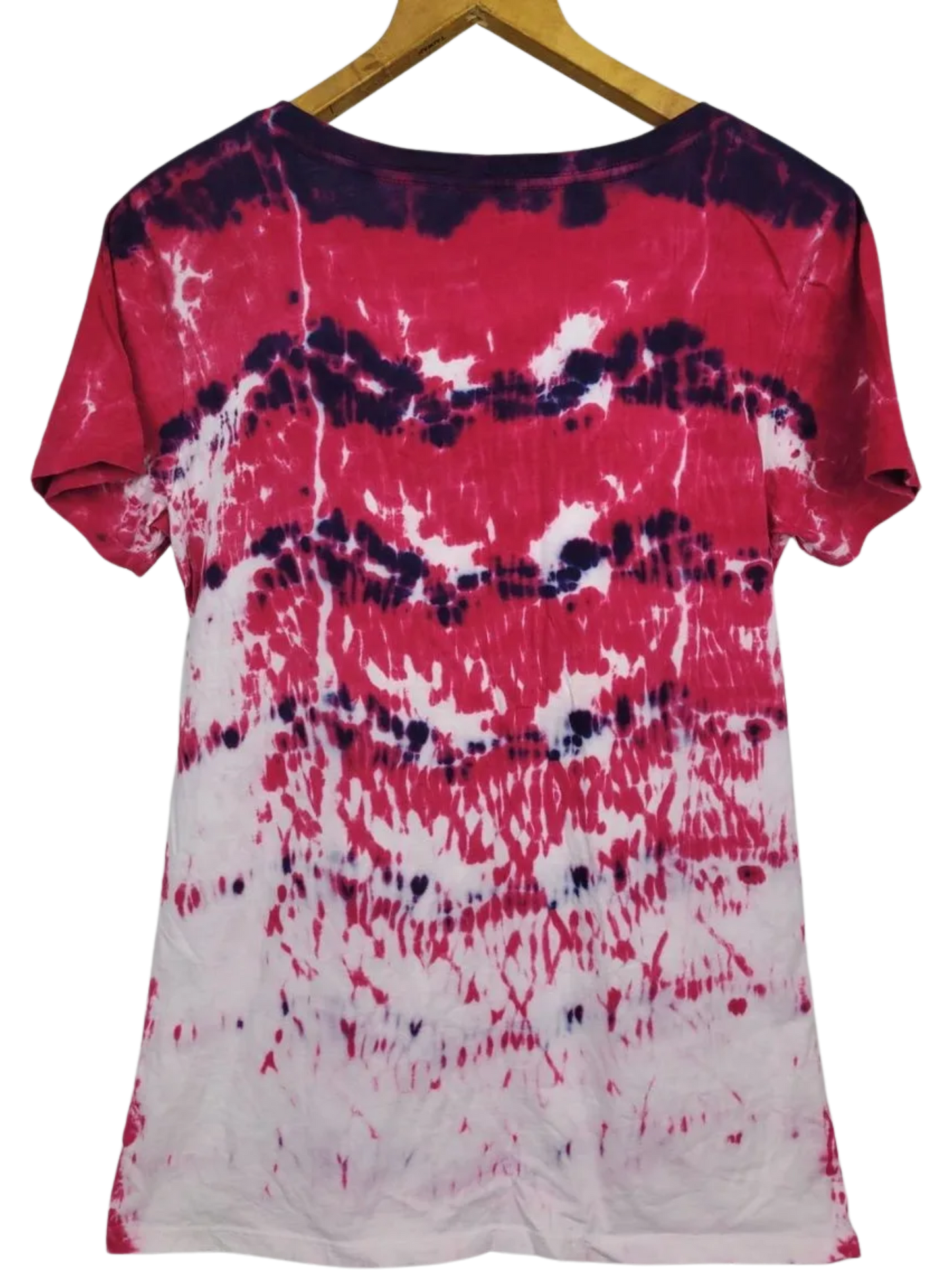 Tie-dye t-shirt with pink and white patterns on a hanger
