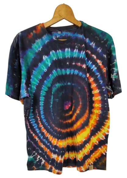 Tie-dye t-shirt with a wig wag pattern on a hanger