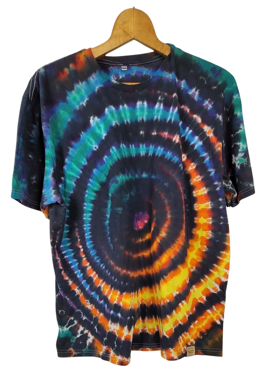 Tie-dye t-shirt with a wig wag pattern on a hanger