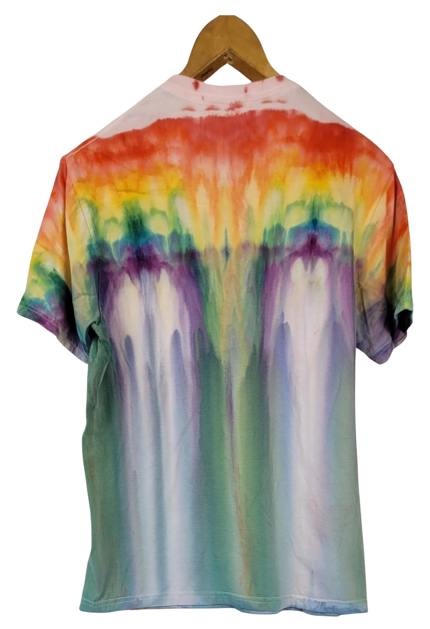 Tie-dye t-shirt with multicolor pattern on a hanger against a white background