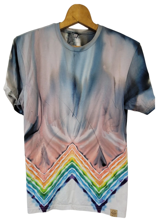 T-shirt with abstract design and rainbow pattern on a hanger