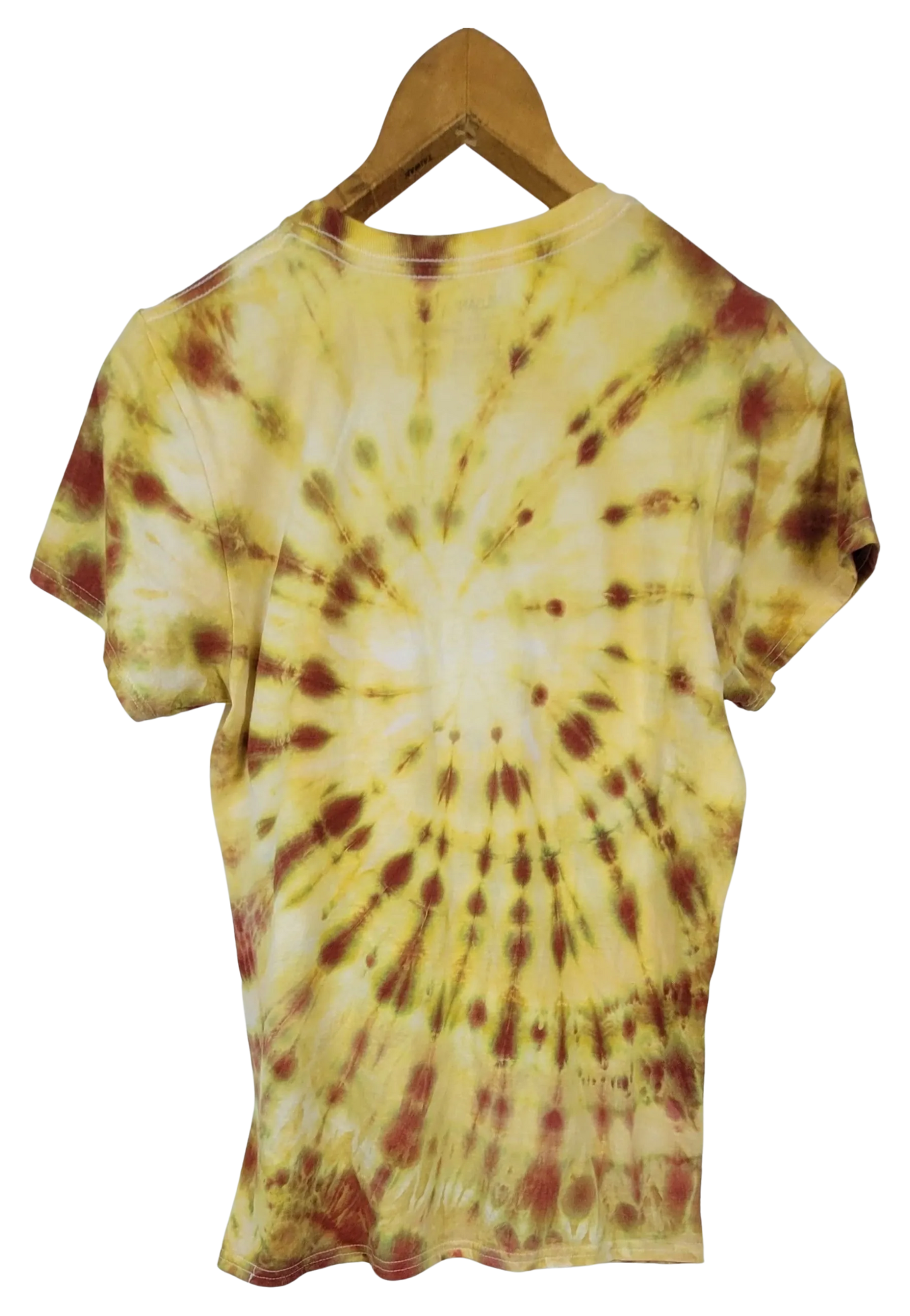 Tie-dye t-shirt with a spiral pattern on a wooden hanger against a white background