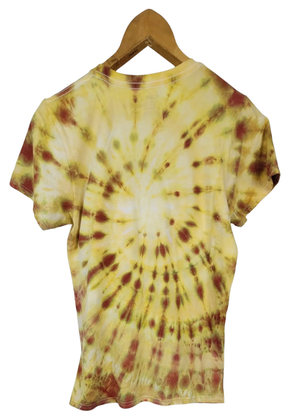 Tie-dye t-shirt with a spiral pattern on a wooden hanger against a white background