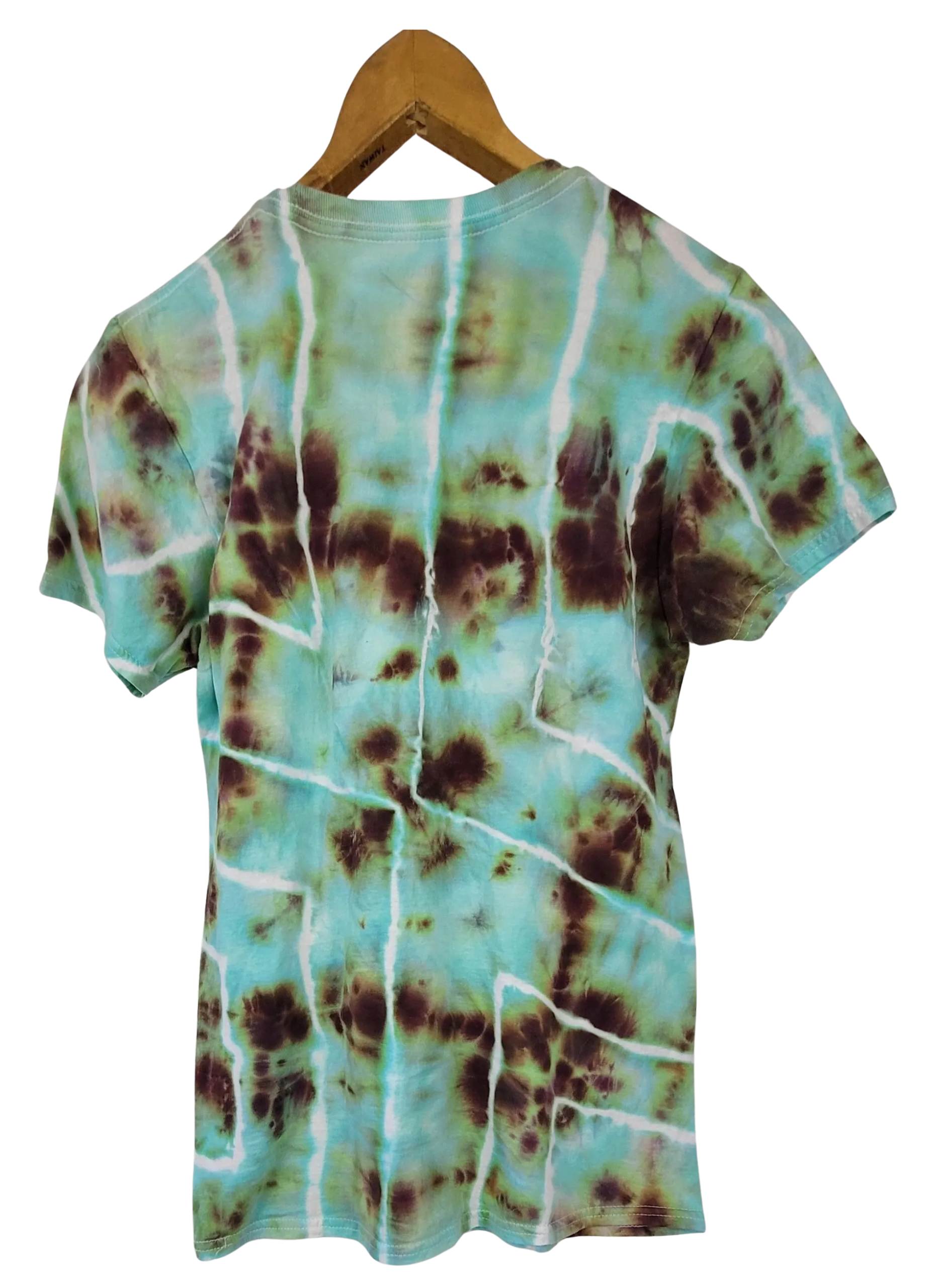 Tie-dye t-shirt with a green and brown pattern on a hanger