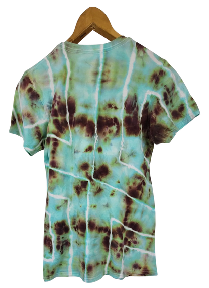 Tie-dye t-shirt with a green and brown pattern on a hanger