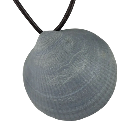 Round gray pendant on a black cord against a white background