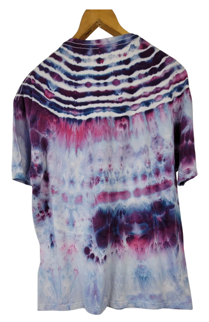 Tie-dye shirt on a hanger with a white background