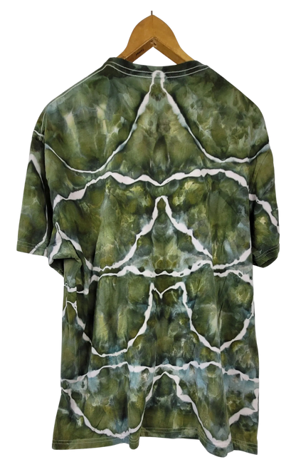 Green tie-dye t-shirt on a wooden hanger against a white background